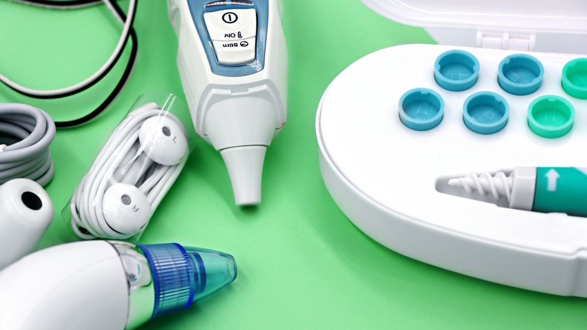 A variety of ear care devices including ear buds, medical instruments, and cleaning tools.